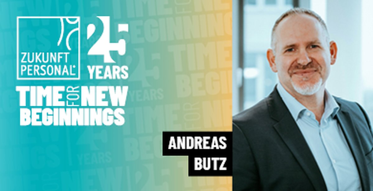 Auf der linken Seite ist der Slogan "Time for new Beginnings" mit dem 25 Jahre Jubiläums Logo zu sehen und rechts ist der Andreas Butz abgebildet